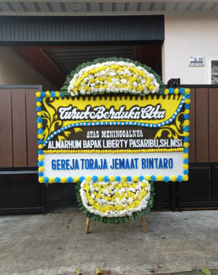 Papan Bunga Duka di Arso Barat